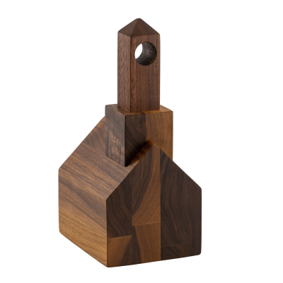 A tiny wooden church with an extravagant steeple.