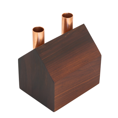 Wooden house with natural finish and two copper chimneys