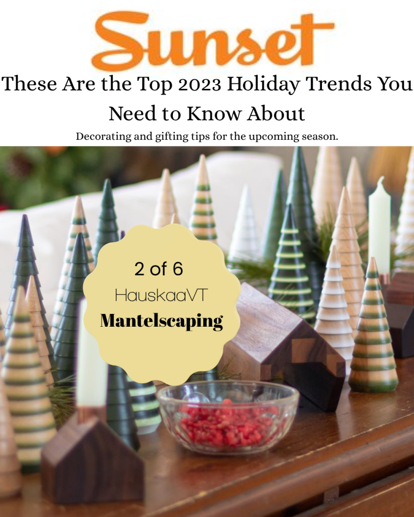 Sunset magazine feature highlighting Hauskaa. The image includes the Sunset logo and the headline: ‘These Are the Top 2023 Holiday Trends You Need to Know About,’ followed by the subheading: ‘Decorating and gifting tips for the upcoming season.’ Below, a photo of a wooden holiday mantel display shows Hauskaa trees and house décor. A graphic overlay reads: ‘2 of 6 — HauskaaVT — Mantelscaping.’