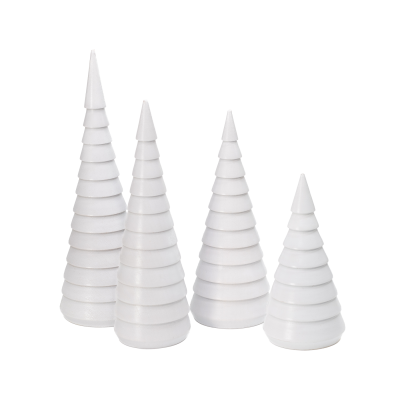 Four tiny white decorative wooden fir trees.